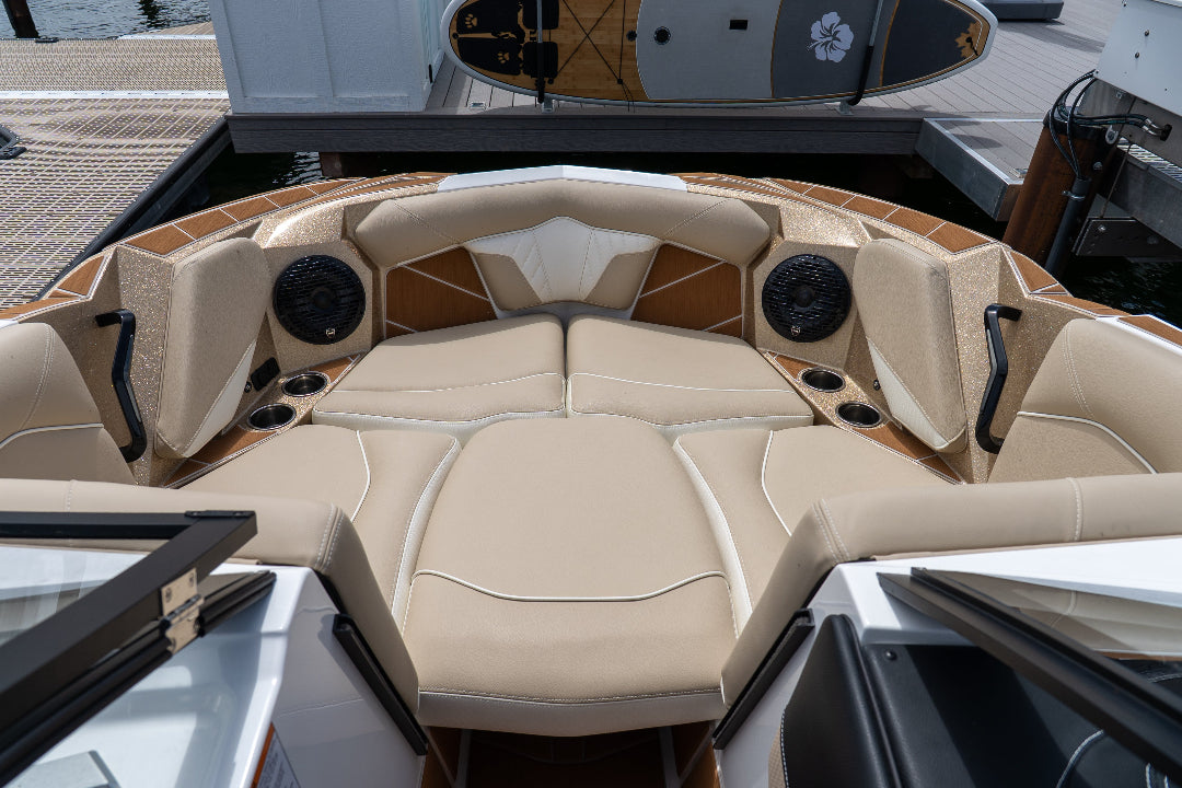 Beige interior of a boat with dashboard and controls